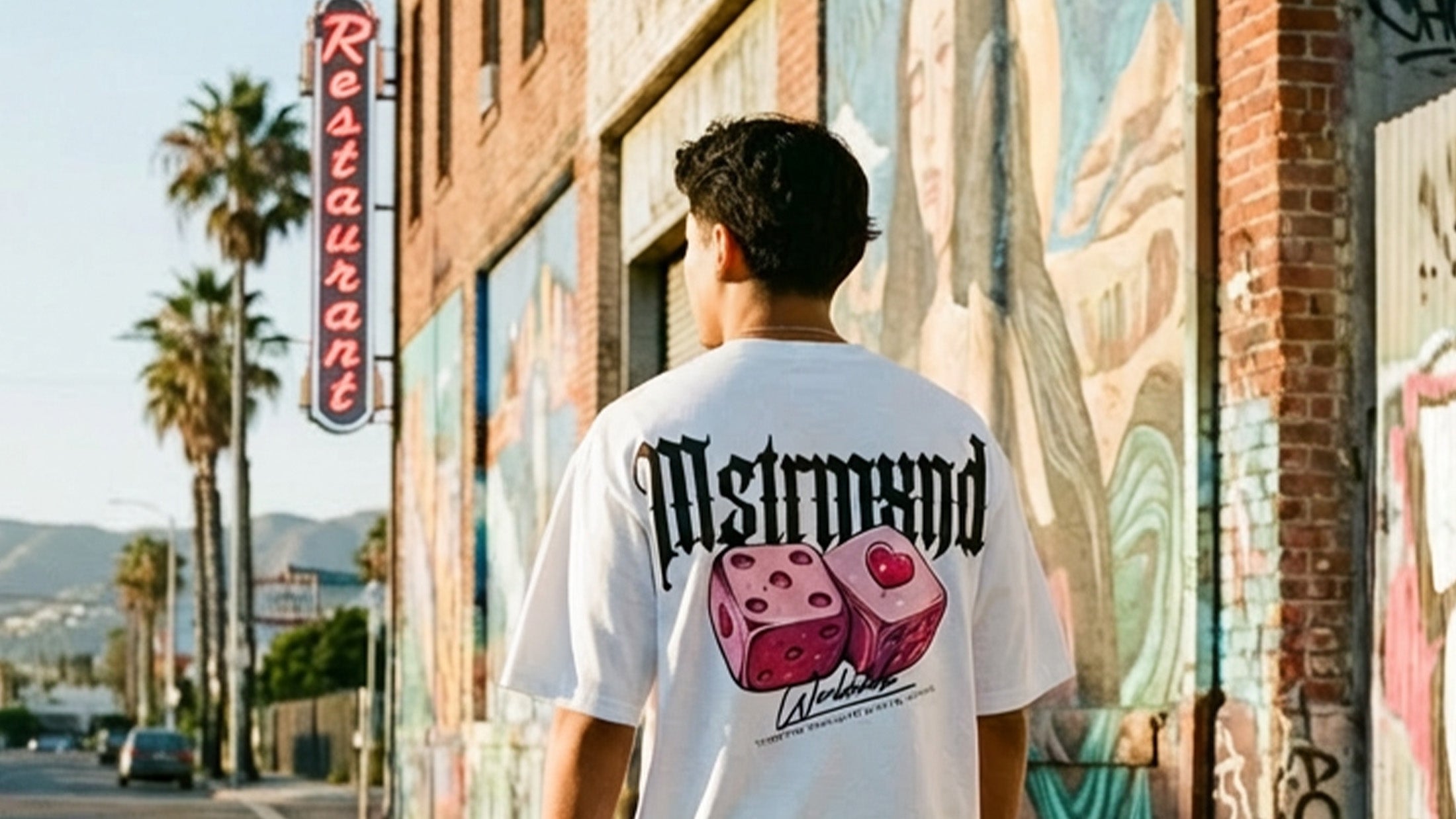 man wearing mstrmxnd graphic tee in long beach ca